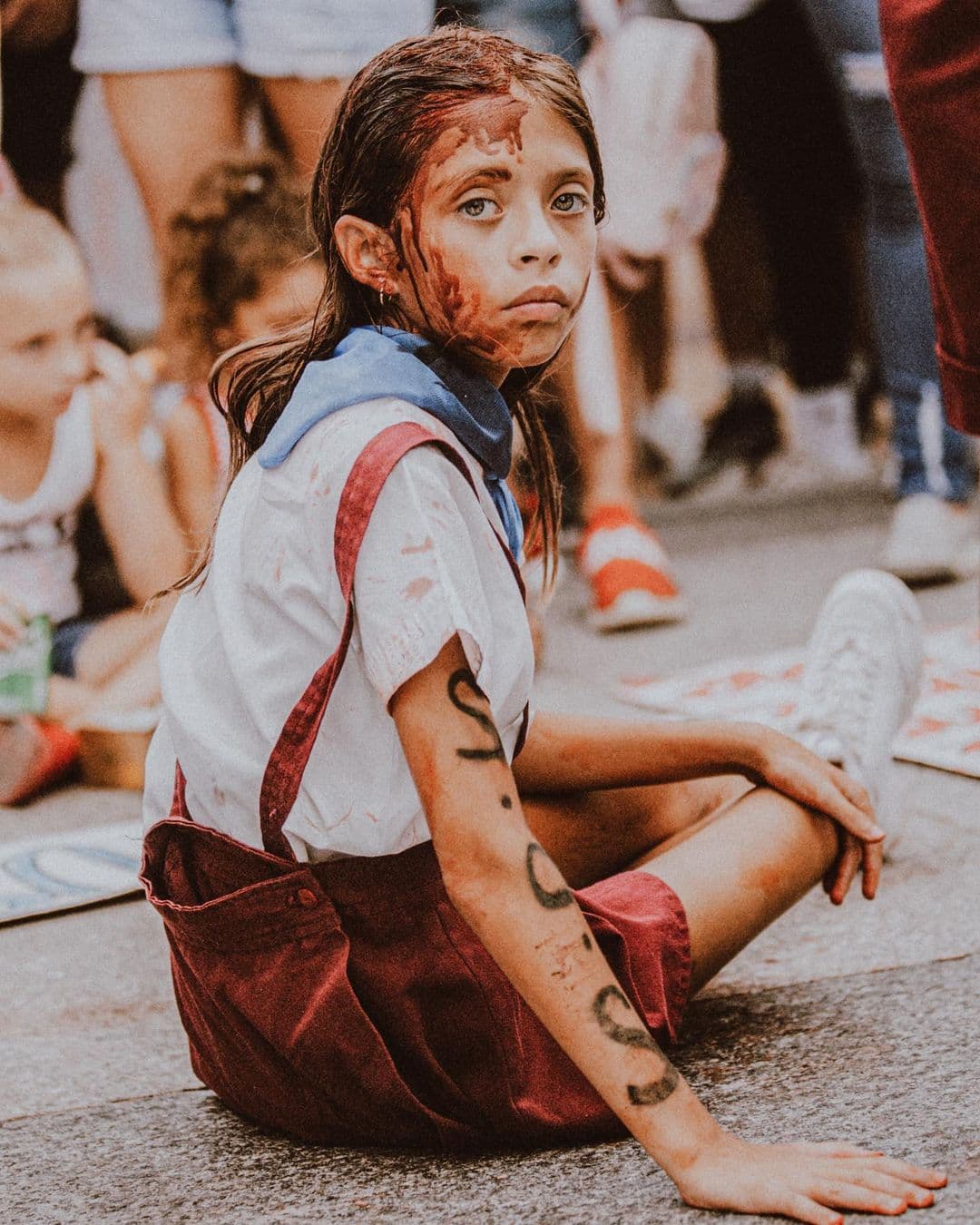 A young woman protesting for freedom in Cuba